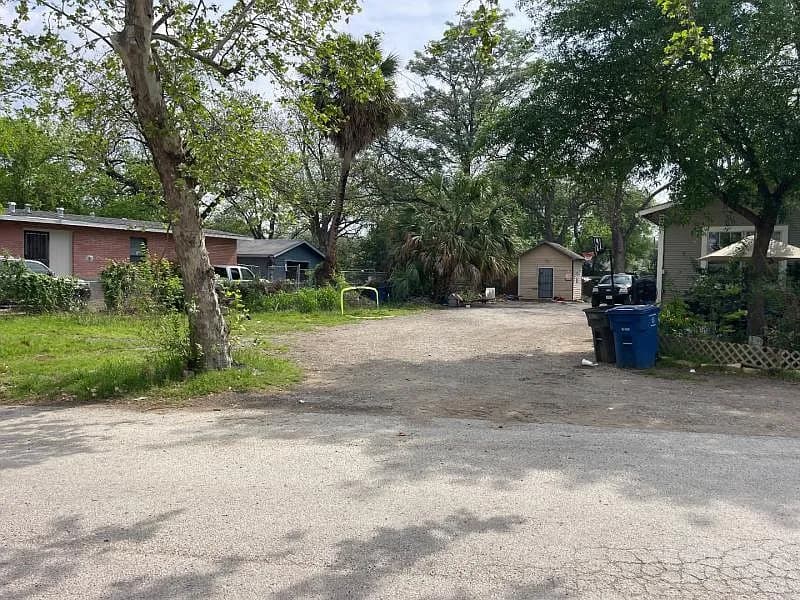Vacant, cleared lot at 116 Fairbanks Ave in San Antonio, Texas, with neighboring homes visible