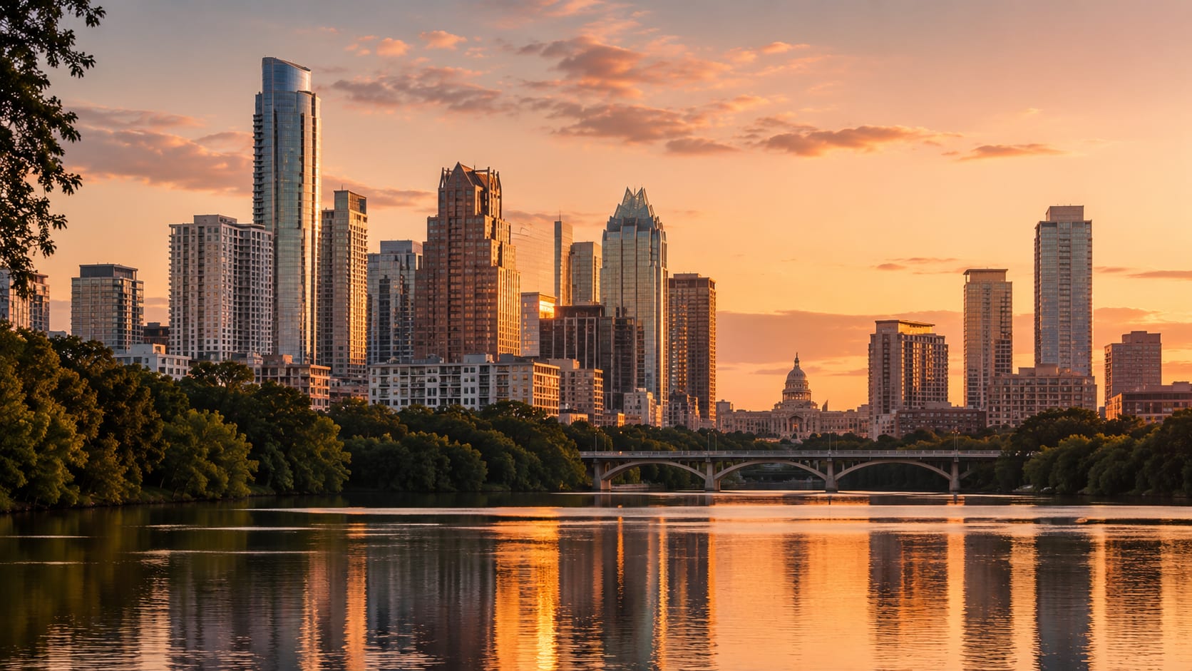Austin skyline at golden hour with the Texas State Capitol in view